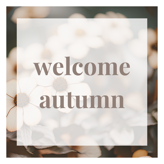 a floral background with brown text saying "welcome autumn" 