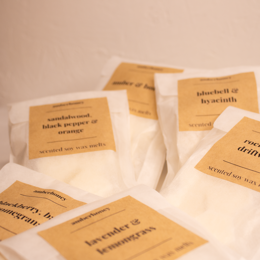 a stack of wax melts from the amberhoney collection